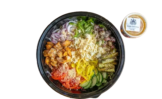 Cheba Hut salad with vegetables, cheese, and dressing