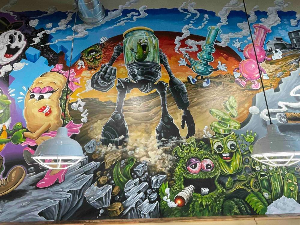 Mural of stoned characters and smoking bongs in Mansfield, TX