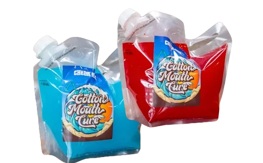 Blue and red Cottonmouth Cure drinks in plastic pouches