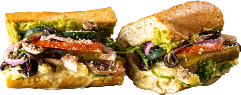 Mowie Wowie Tropical Veggie toasted sub with hummus, guacamole, honey mustard, green bell peppers, and pineapple.