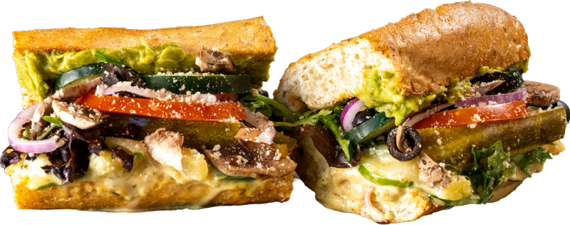 Mowie Wowie Tropical Veggie toasted sub with hummus, guacamole, honey mustard, green bell peppers, and pineapple.