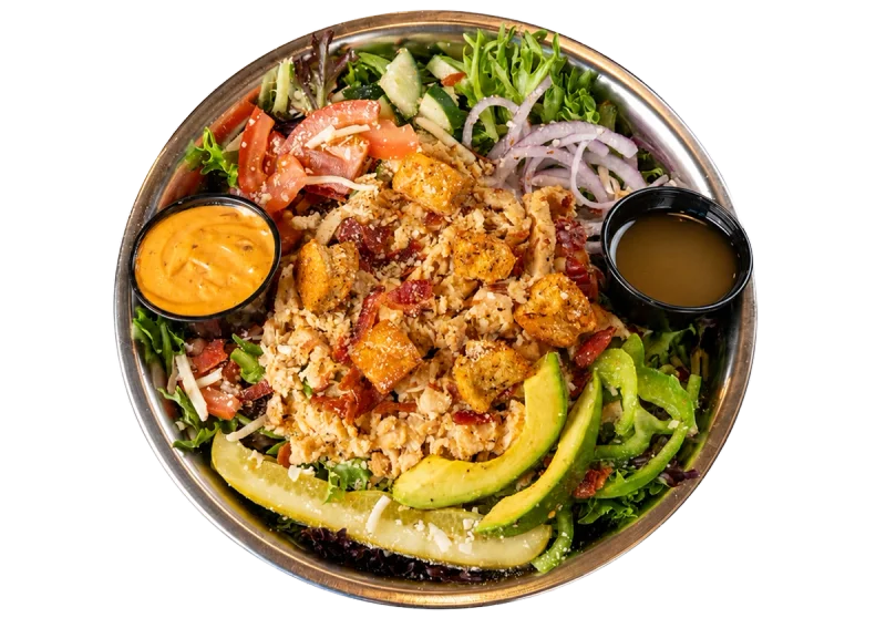 Kali Twist spicy CHICKEN club salad with grilled chicken breast, spring mix, tomatoes, green bell peppers, and onion.